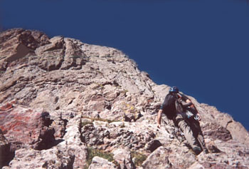 JAMES CLIMBING ABOVE THE RED KNOB
