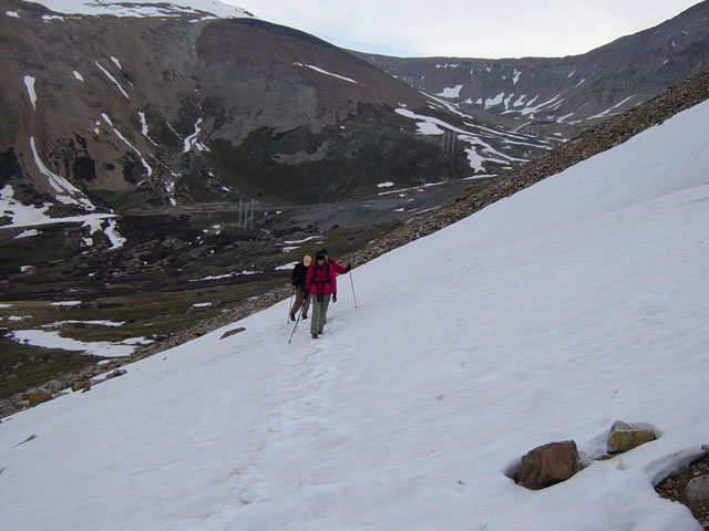 On the snowbanks.